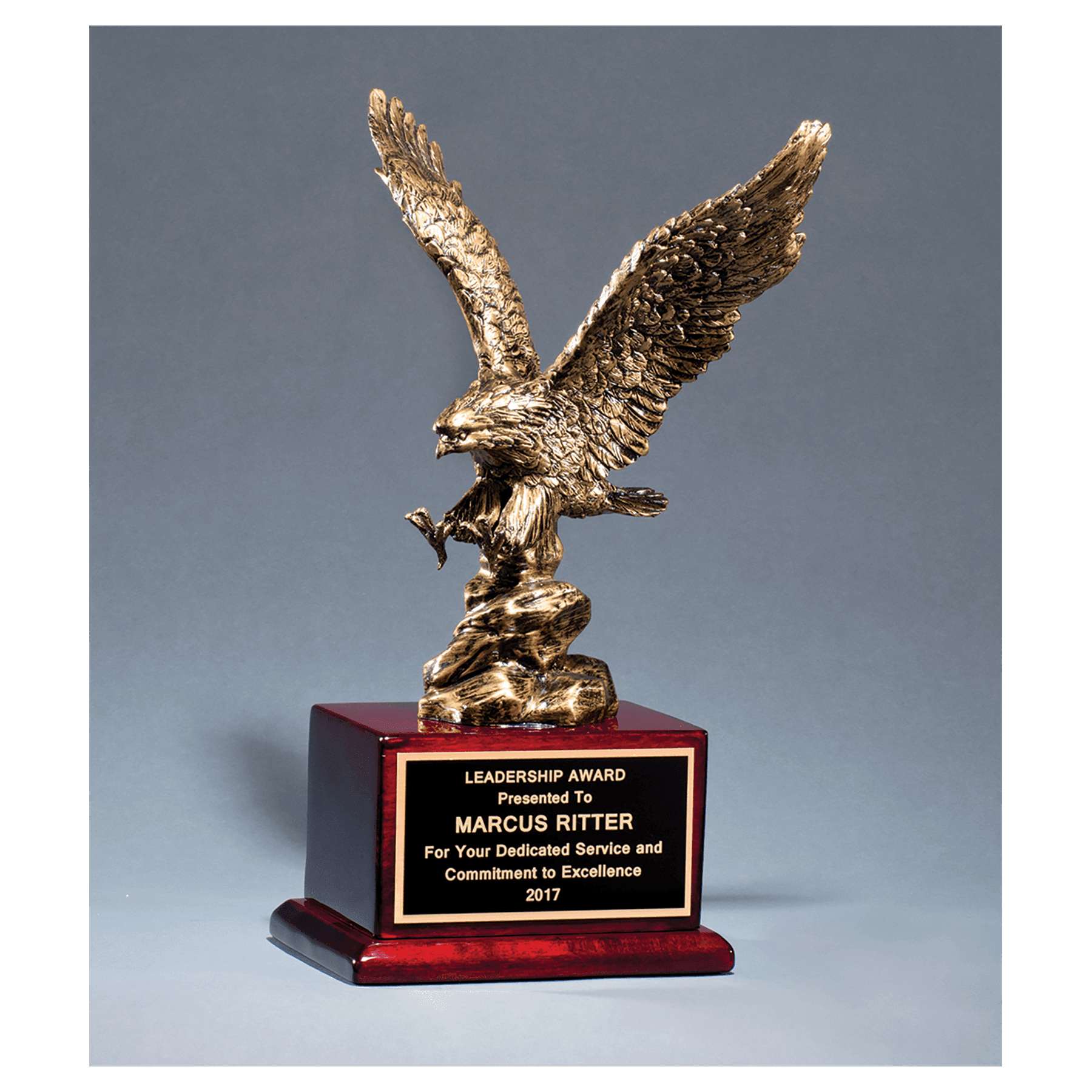 Antique Bronze Finished Eagle Resin Casting on a Rosewood Piano Finish Base